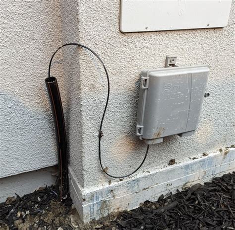 att uverse junction box|exposed cable in yard.